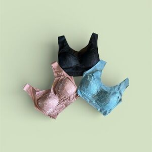 Elegant seamless bras size medium color aquamarine rose and black wore 1 once